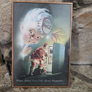 Coca-Cola advertisement featuring the iconicSanta Claus and Spirit Boy 1948
